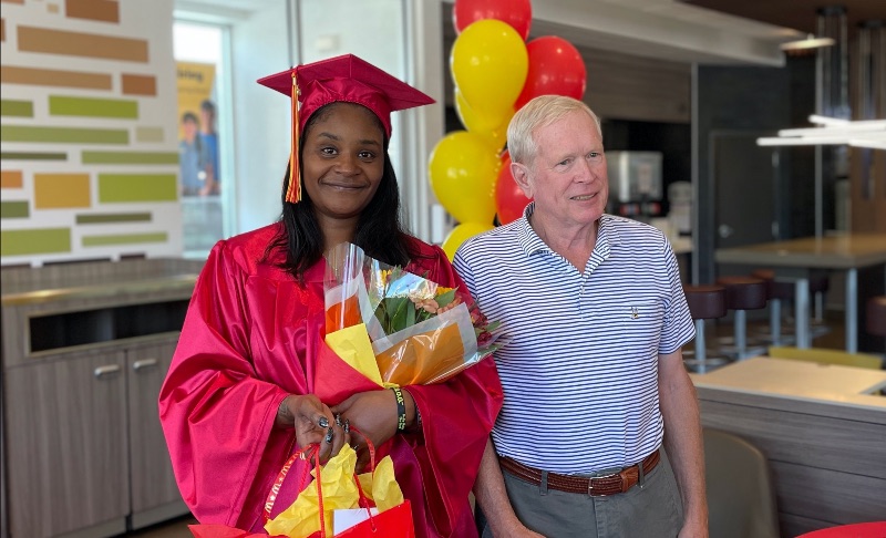 Owner Operator John Blickle from Rubber City McDonald’s in Akron, Ohio, with employee Portia Kelly, celebrating her COHS graduation
